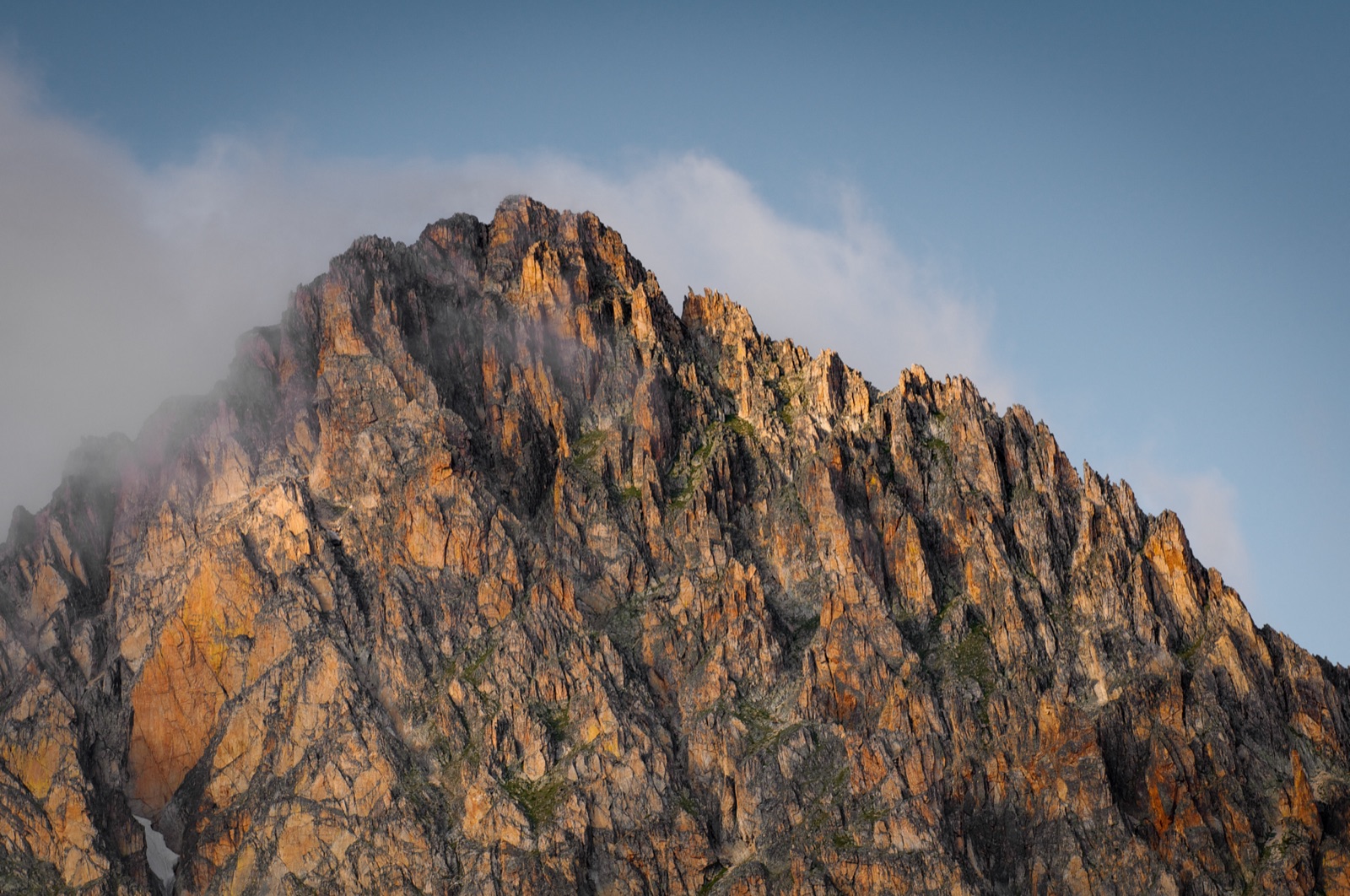 Rocky summit lit by the sun