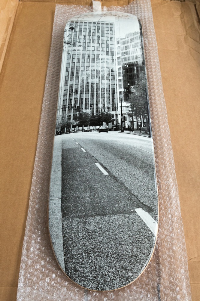 Photograph printed on a skateboard deck